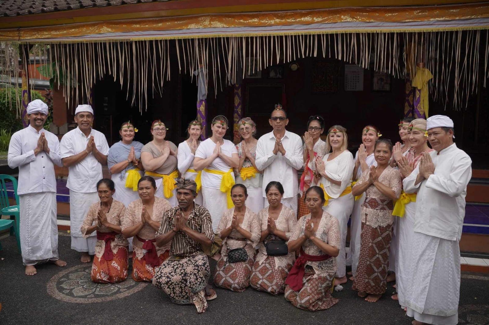 Retreat group in traditional Balinese dress
